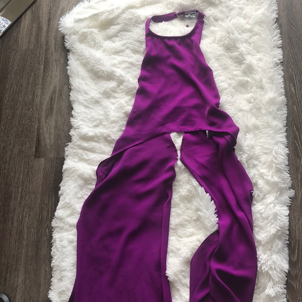 High neck Backless Tail Top.